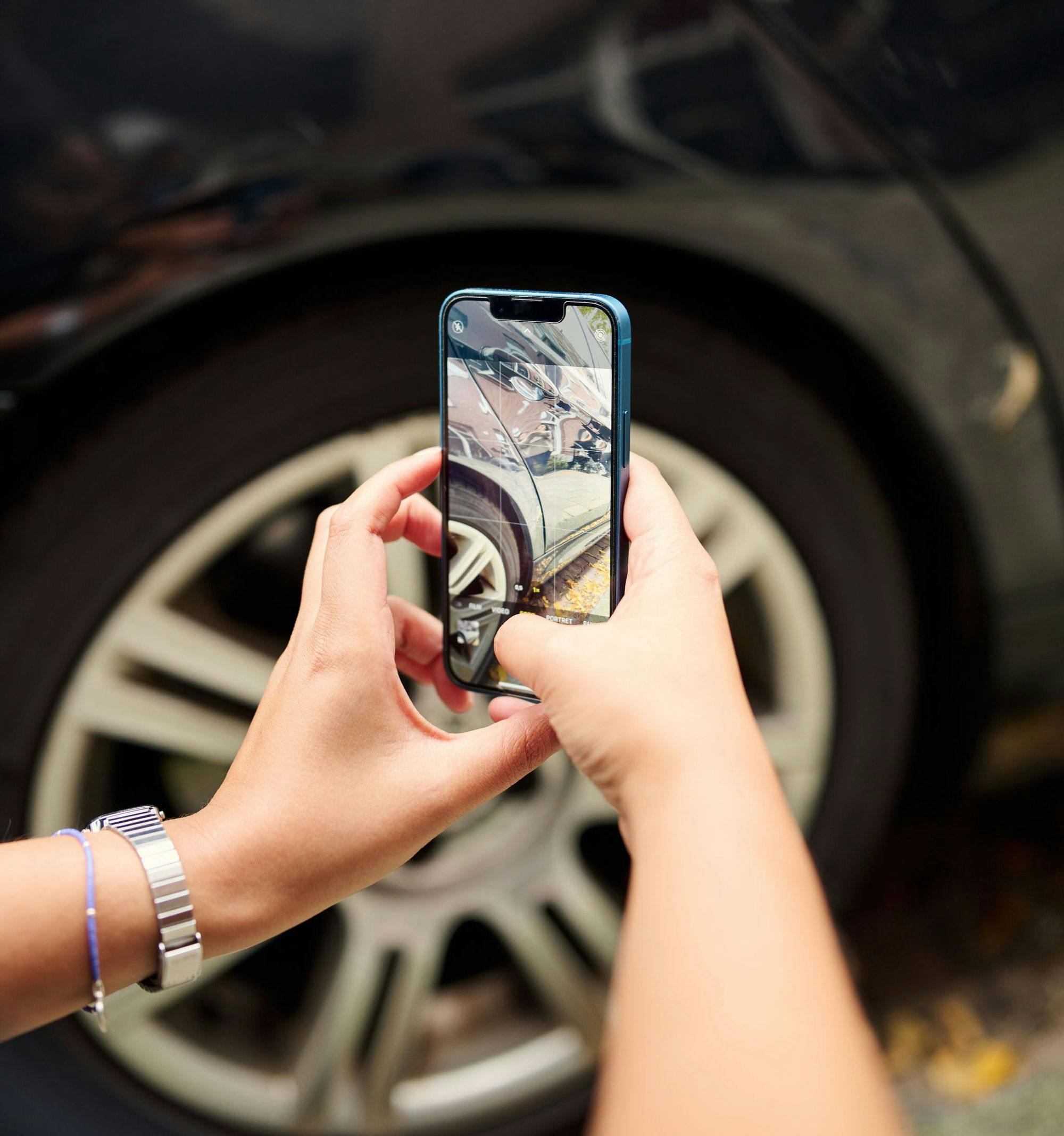 Taking photo of car damage